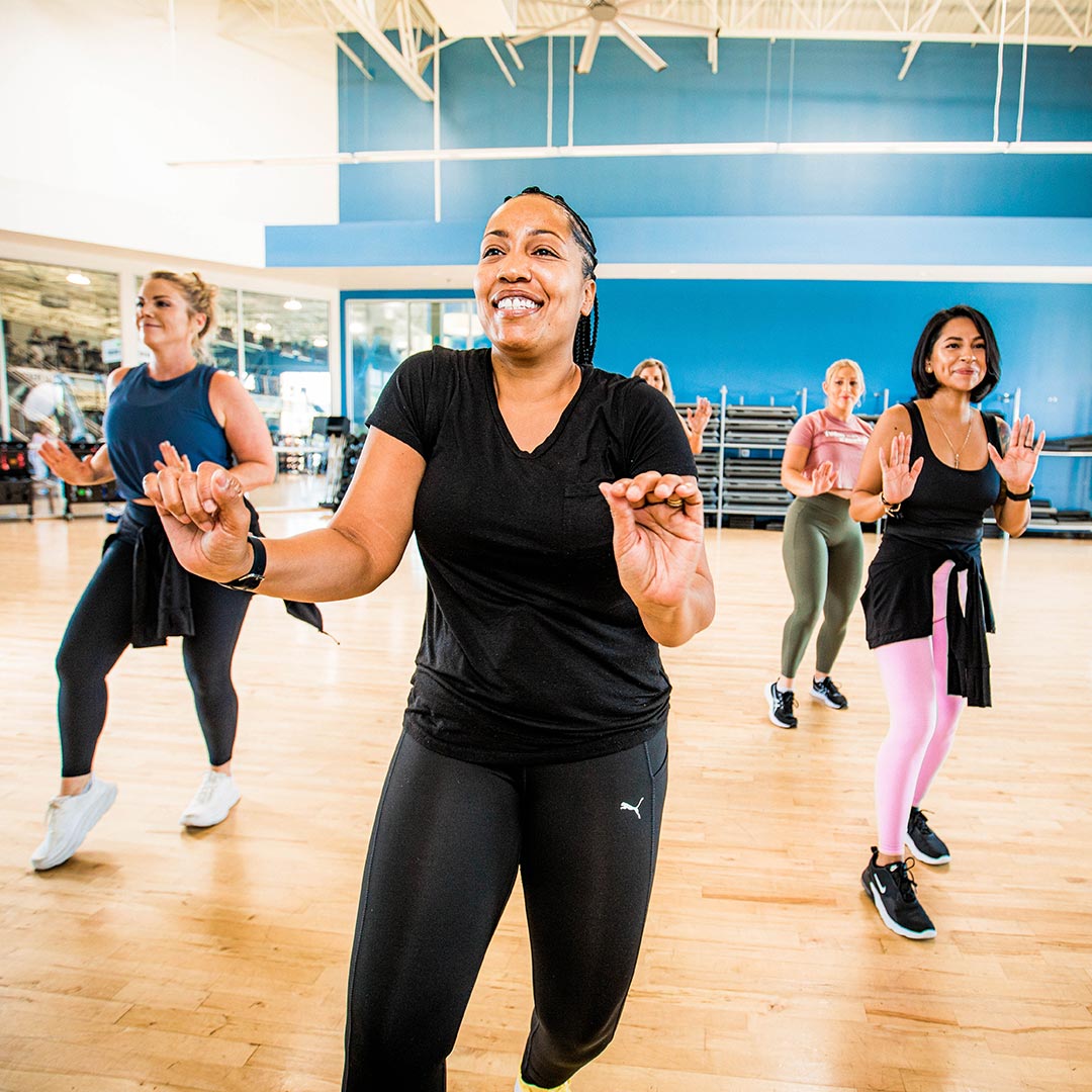 A group of people in a Dance class