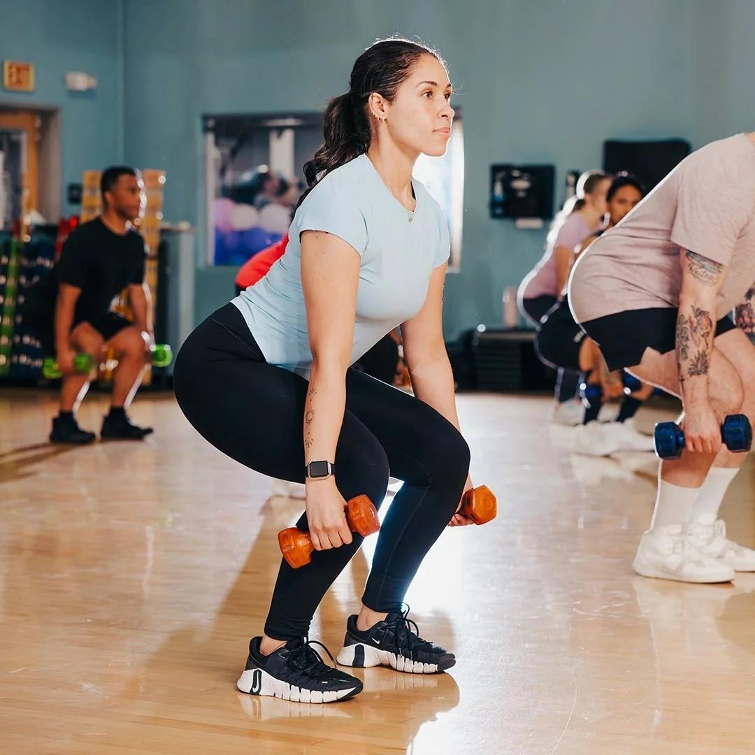 A group of people in a Pilates class